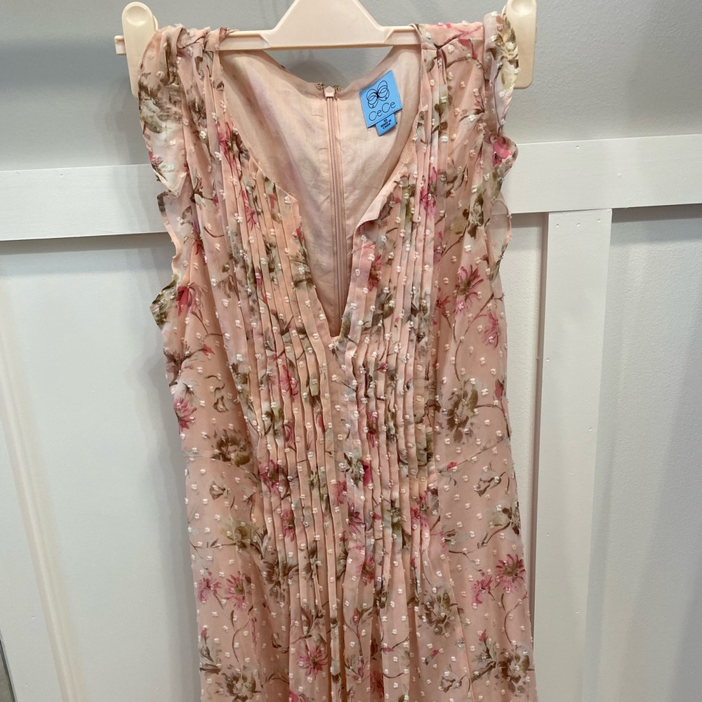 Pink floral dress. Low V neckline